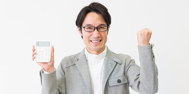 Man with calculator first pumping in excitement